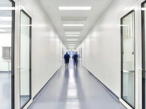 Track Layouts for Long Corridor Wall Washing Without Scallops